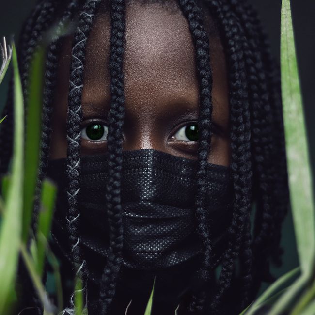 Coiffure enfant avec tresses soignées chez Tacko Beauty